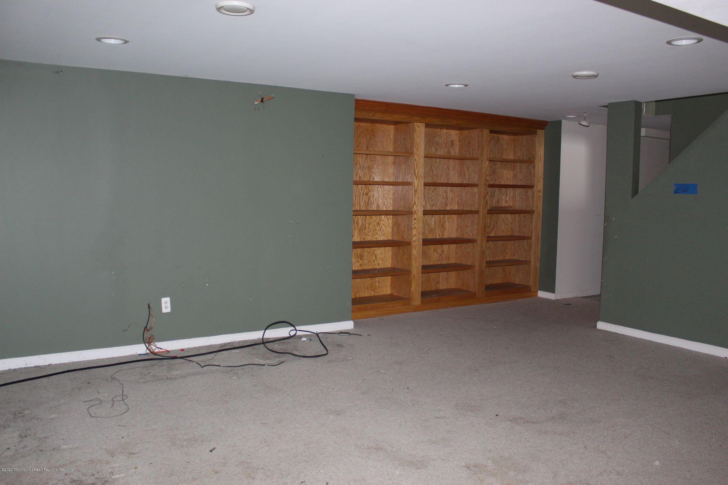 211 Cassville Road Jackson, NJ 08527 - Photo 39 of 58 an empty room with a empty space and empty shelves