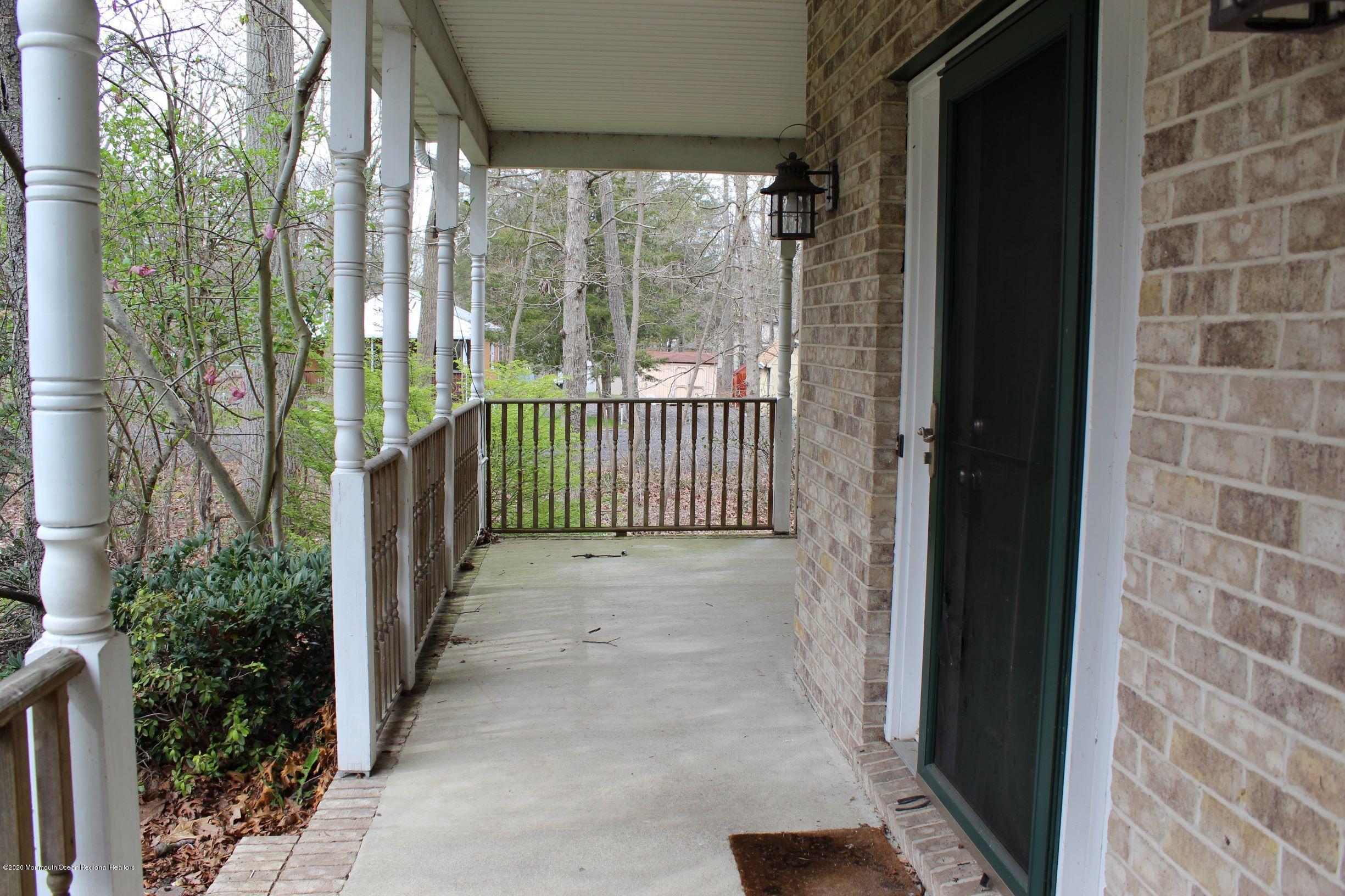 211 Cassville Road Jackson, NJ 08527 - Photo 5 of 58 a view of a porch