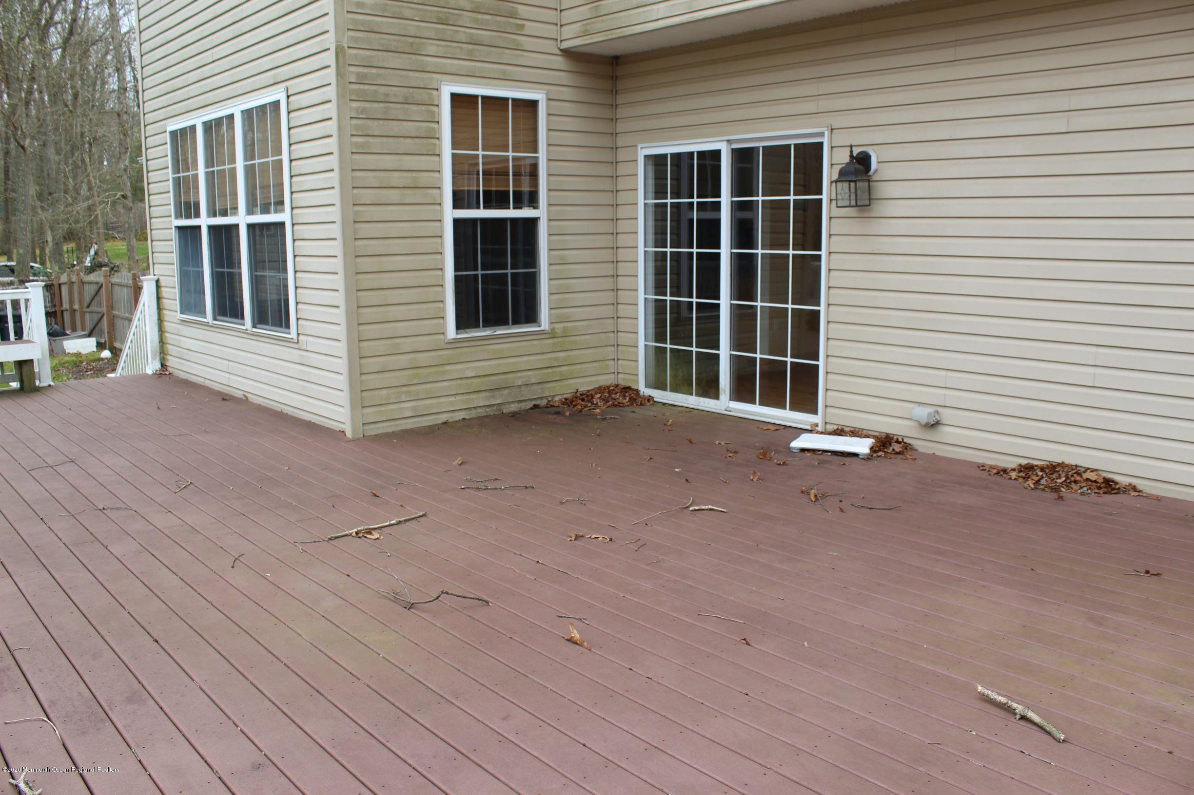 211 Cassville Road Jackson, NJ 08527 - Photo 51 of 58 a view of a house with wooden deck