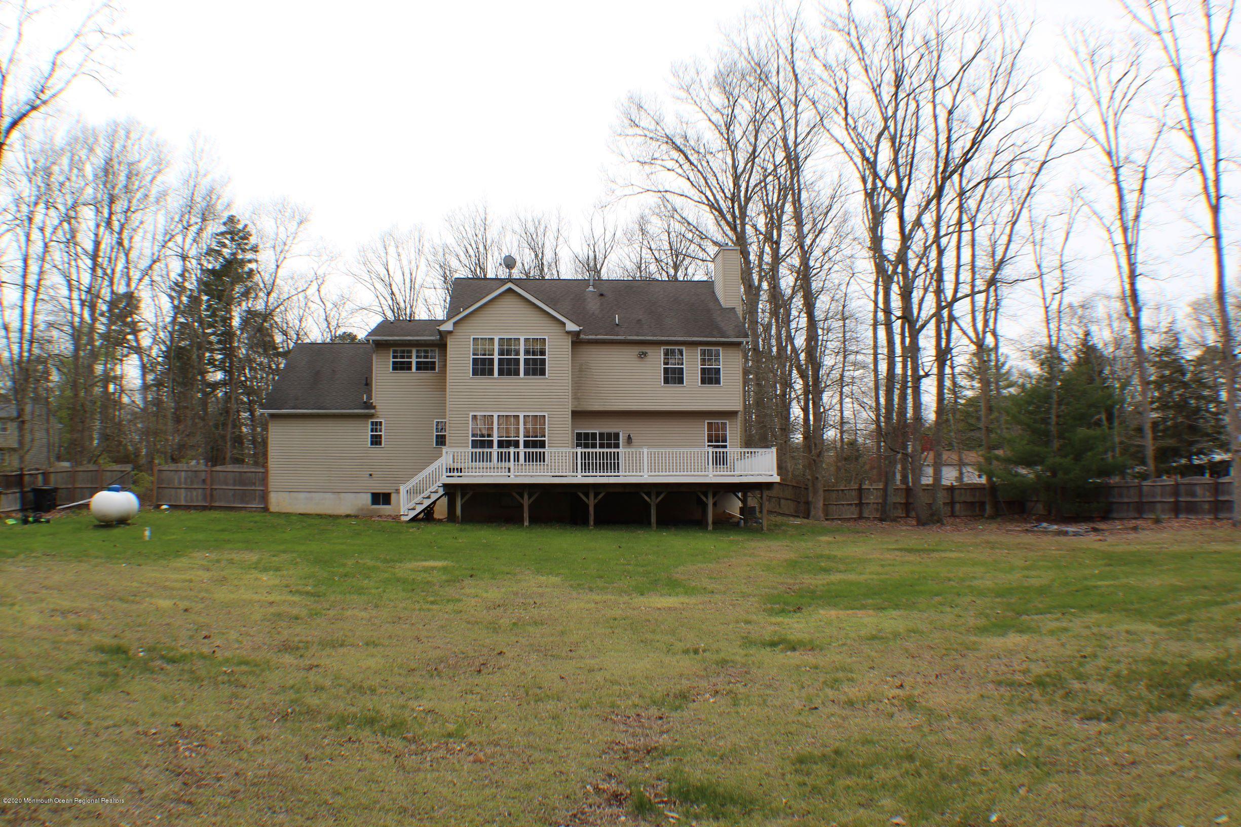 211 Cassville Road Jackson, NJ 08527 - Photo 54 of 58 a view of a house with a yard and sitting area