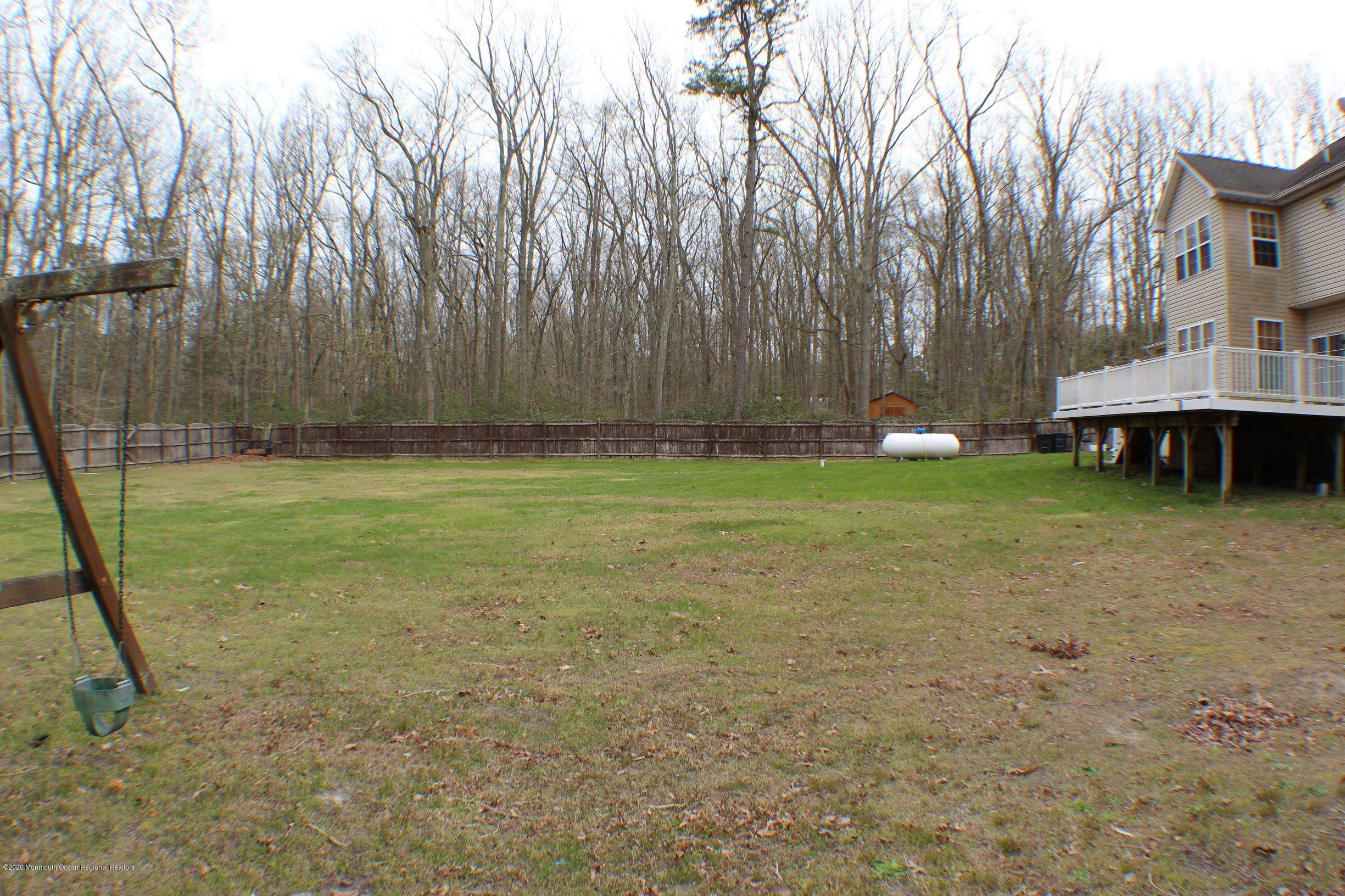 211 Cassville Road Jackson, NJ 08527 - Photo 56 of 58 a view of a house with backyard