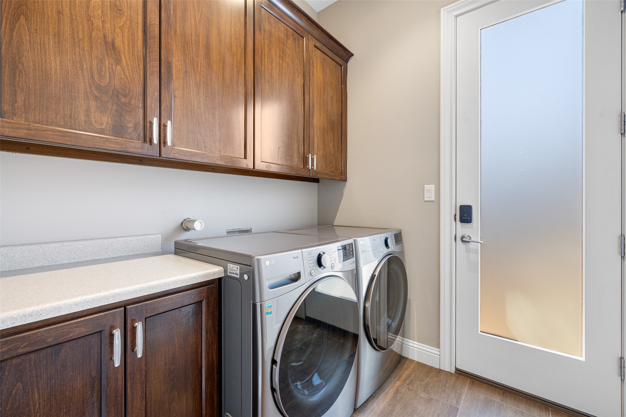 1017 South Quinlan Park Road Austin, TX 78732 - Photo 25 of 39 a utility room with dryer and washer