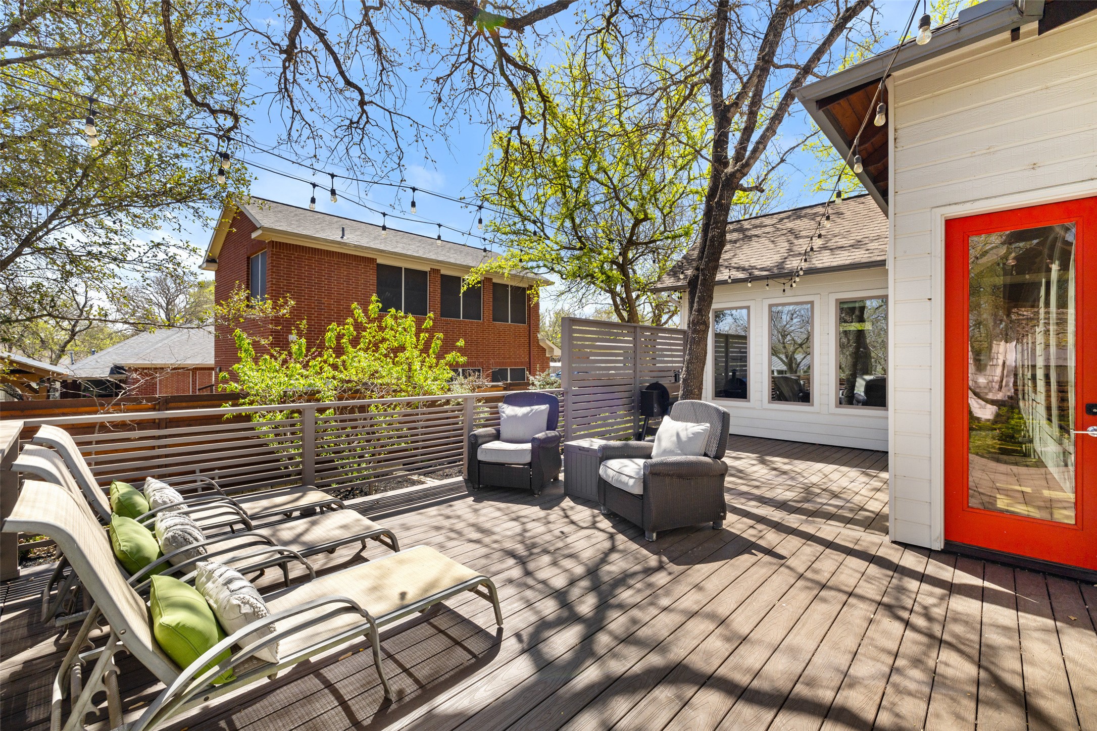 1017 South Quinlan Park Road Austin, TX 78732 - Photo 28 of 39 a view of a patio with couches table and chairs and potted plants