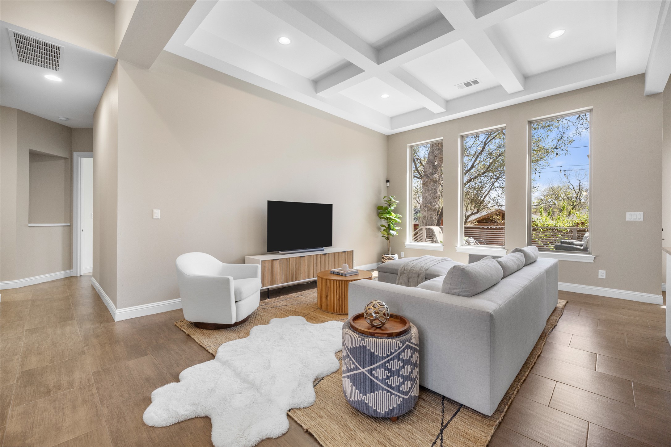 1017 South Quinlan Park Road Austin, TX 78732 - Photo 10 of 39 a living room with furniture and a flat screen tv