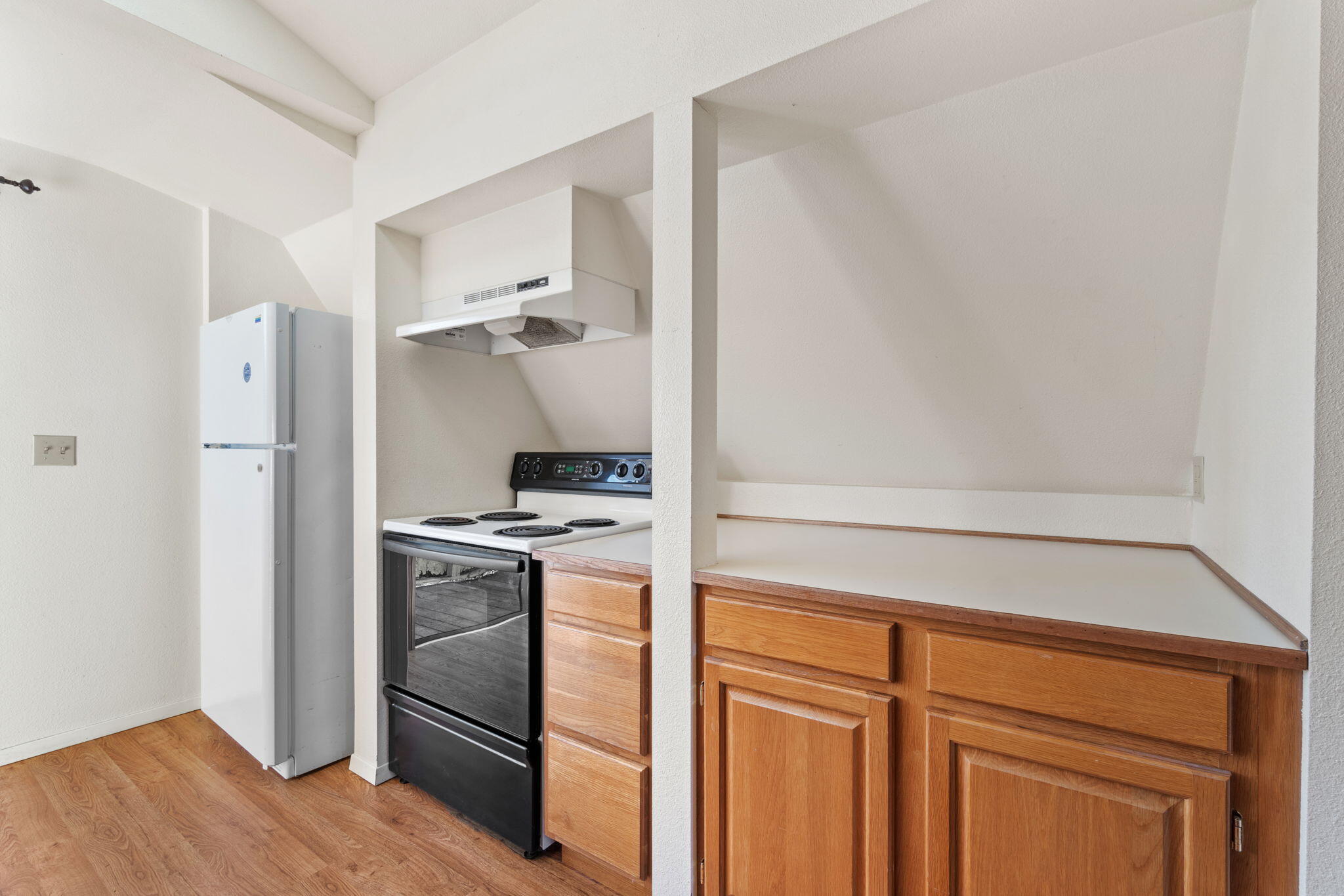 61 Kingston Road Fieldbrook, CA 95519 - Photo 28 of 48 a kitchen with a stove and a refrigerator