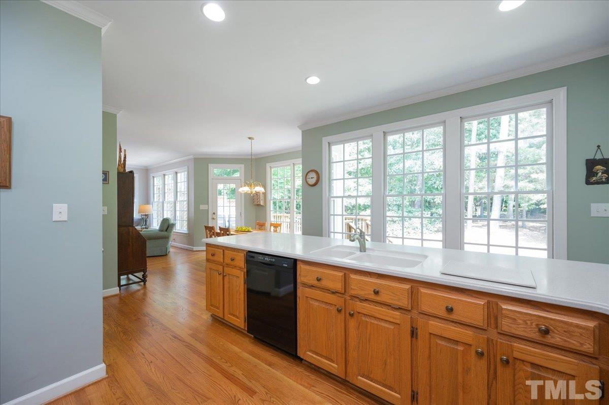 7025 Spring Ridge Road Cary, NC 27518 - Photo 15 of 35 a large kitchen with granite countertop a large window