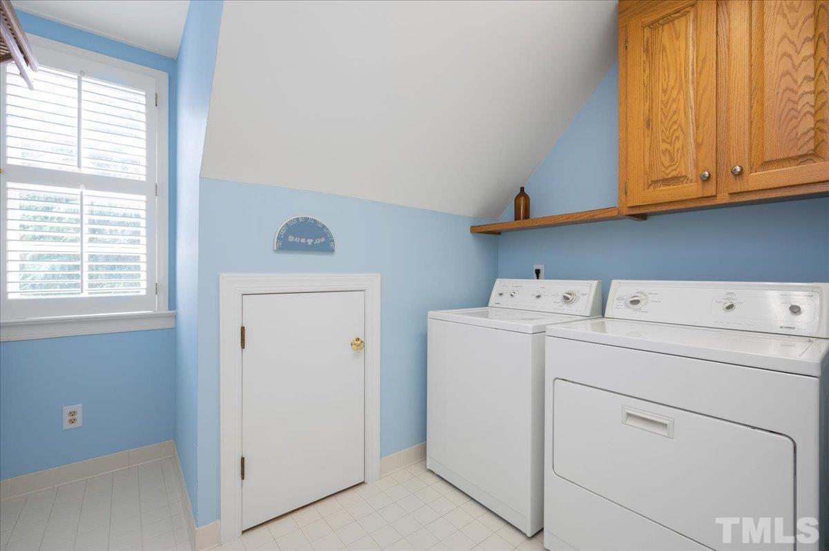 7025 Spring Ridge Road Cary, NC 27518 - Photo 29 of 35 a utility room with dryer and washer