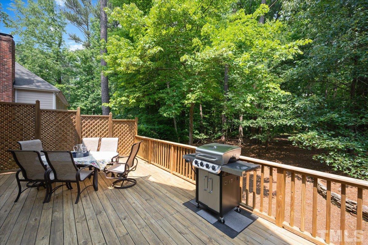 7025 Spring Ridge Road Cary, NC 27518 - Photo 35 of 35 a view of balcony with furniture and trees