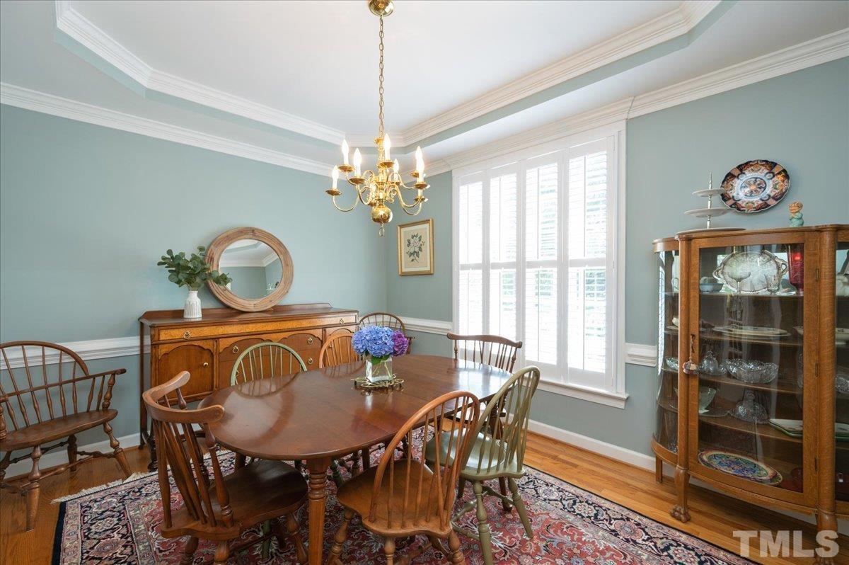 7025 Spring Ridge Road Cary, NC 27518 - Photo 5 of 35 a view of a dining room with furniture window and outside view