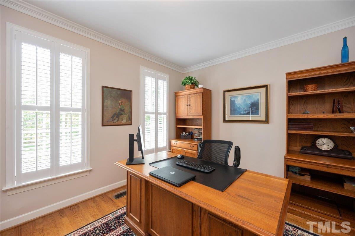 7025 Spring Ridge Road Cary, NC 27518 - Photo 8 of 35 a work room with furniture and a window
