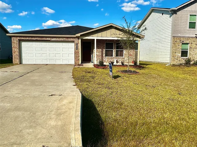 a view of a terrace with a table and chairs