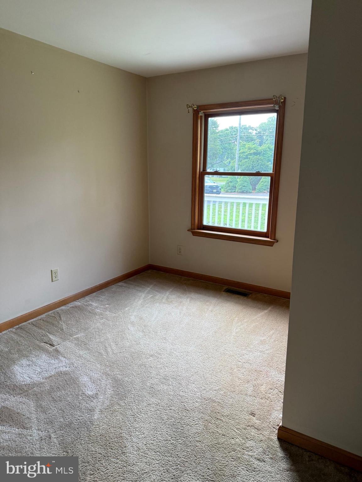 217 Carmel Road Millville, NJ 08332 - Photo 8 of 23 an empty room with a window