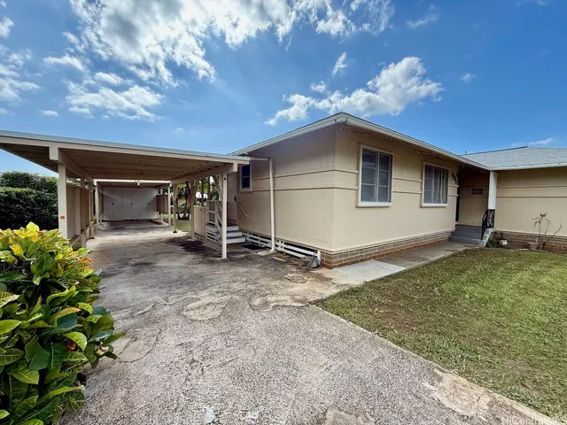 a view of a house with a patio