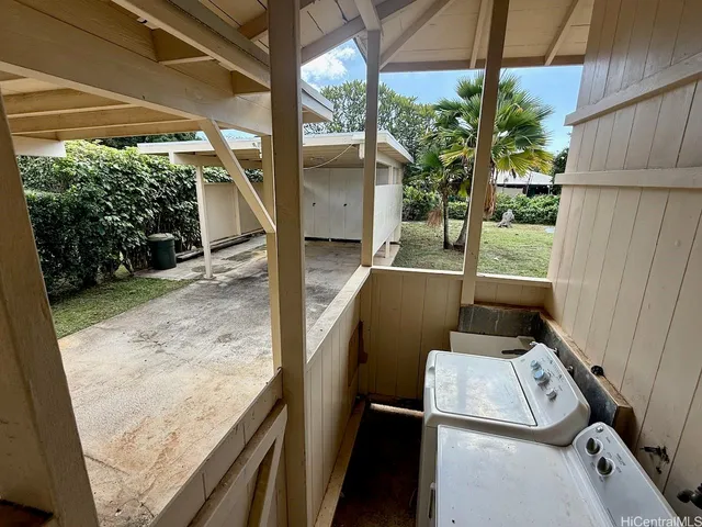 a view of a balcony with chair