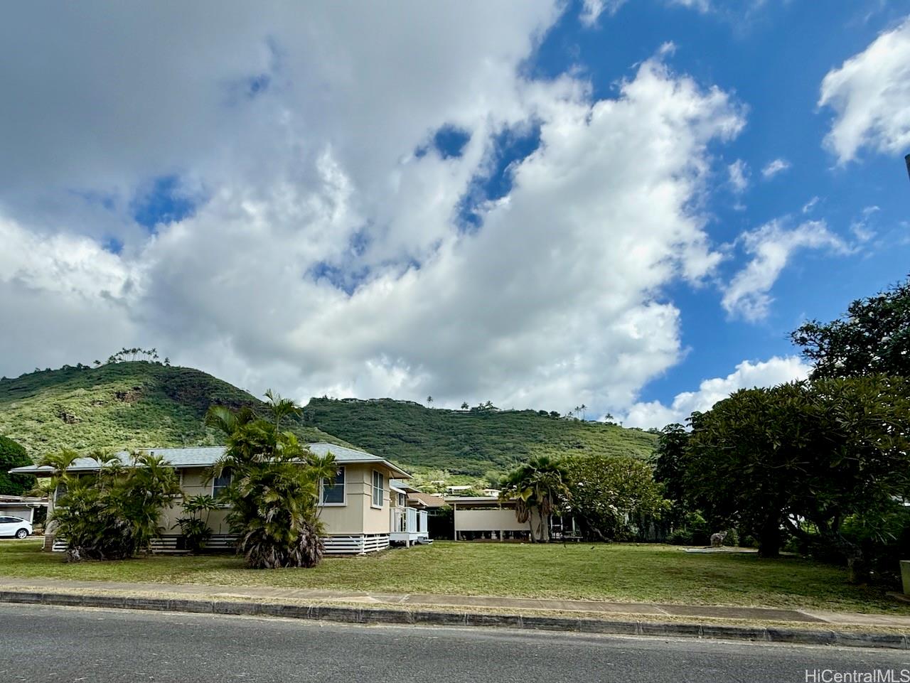 5265 Manauwea Street Honolulu, HI 96821 - Photo 24 of 24 a view of a house with a yard