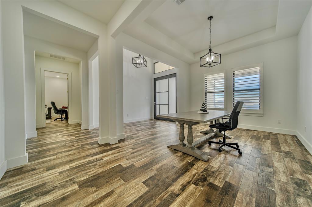 165 Ranch House Road Rockwall, TX 75032 - Photo 16 of 40 a view of a room with gym equipment