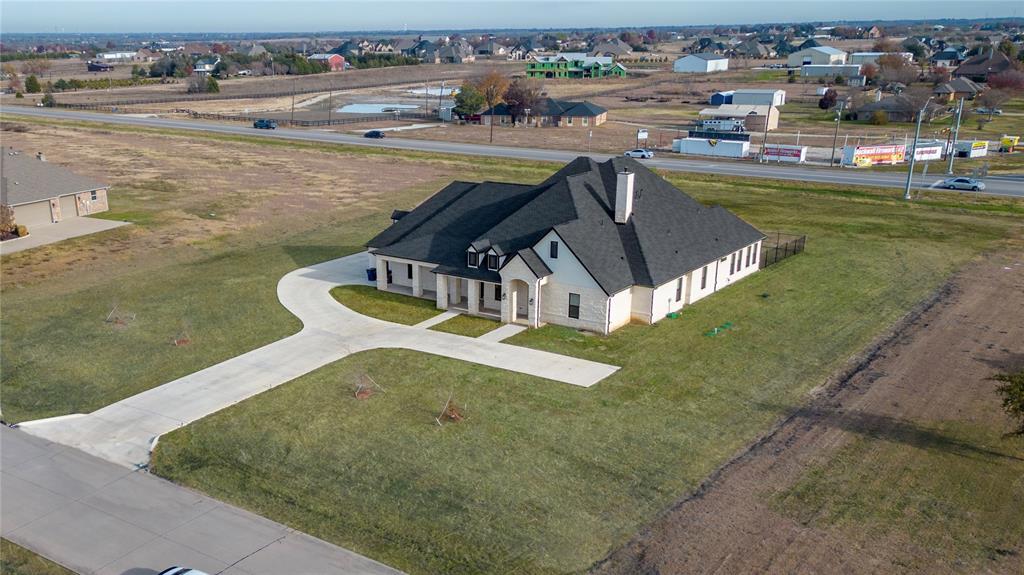 165 Ranch House Road Rockwall, TX 75032 - Photo 2 of 40 a view of a lake with a yard