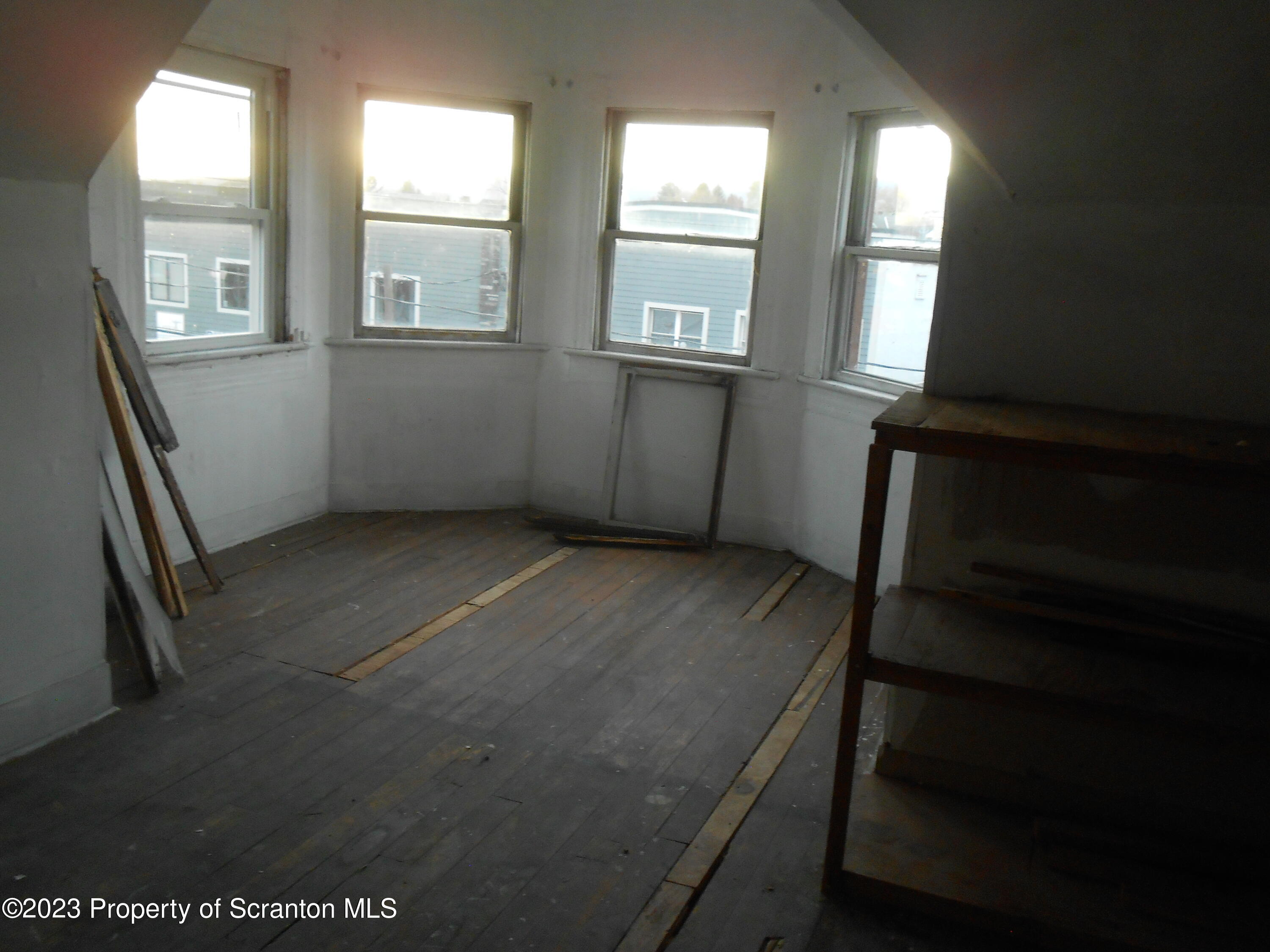 1217 South 1219 Main Avenue Scranton, PA 18504 - Photo 14 of 14 an empty room with windows