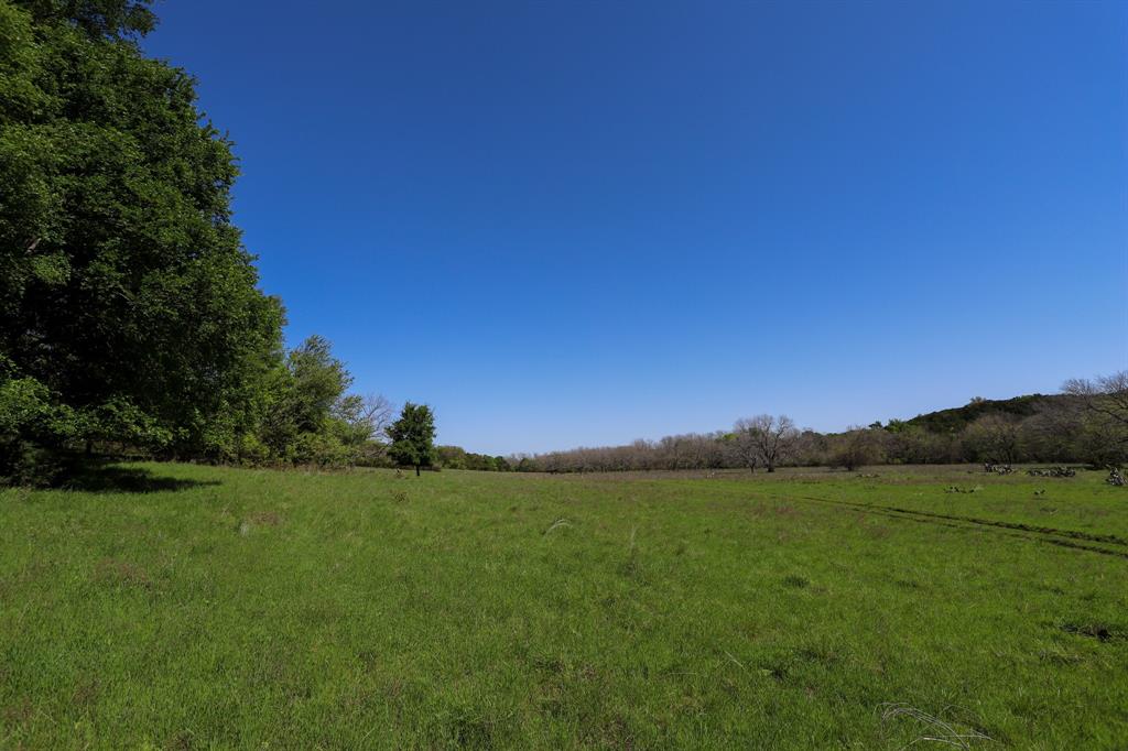 Tbd Tbd Oglesby Neff Park Road Moody, TX 76557 - Photo 6 of 35 a view of a grassy field with trees in the background