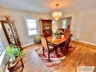 83 Ravine Drive Matawan, NJ 07747 - Photo 14 of 33 a view of a dining room with furniture and window