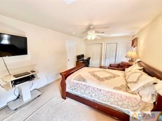 83 Ravine Drive Matawan, NJ 07747 - Photo 21 of 33 a bedroom with a bed and a flat screen tv