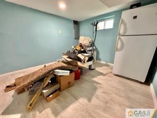 83 Ravine Drive Matawan, NJ 07747 - Photo 27 of 33 a view of a room with gym equipment