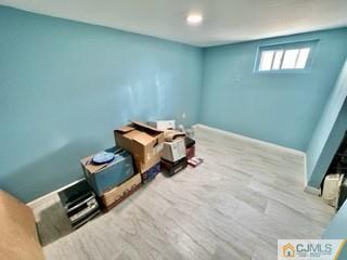 83 Ravine Drive Matawan, NJ 07747 - Photo 28 of 33 a room with furniture and a window