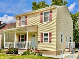 83 Ravine Drive Matawan, NJ 07747 - Photo 3 of 33 a view of a house with a yard