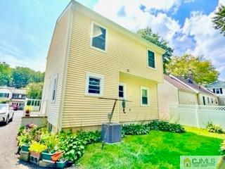 83 Ravine Drive Matawan, NJ 07747 - Photo 5 of 33 a view of a back yard of the house