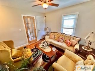83 Ravine Drive Matawan, NJ 07747 - Photo 9 of 33 a living room with furniture and wooden floor