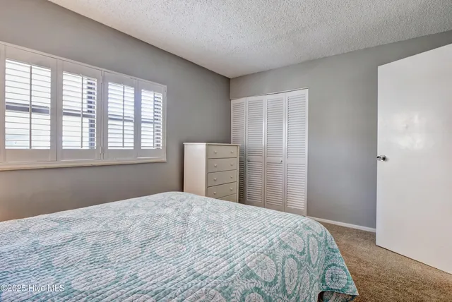 $1,165,000 | 1704 North Lumina Avenue, Unit 1A, Wrightsville Beach, NC 28480