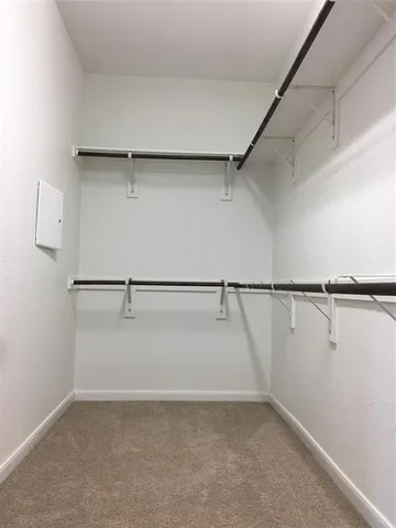 a view of a room with racks on the wall