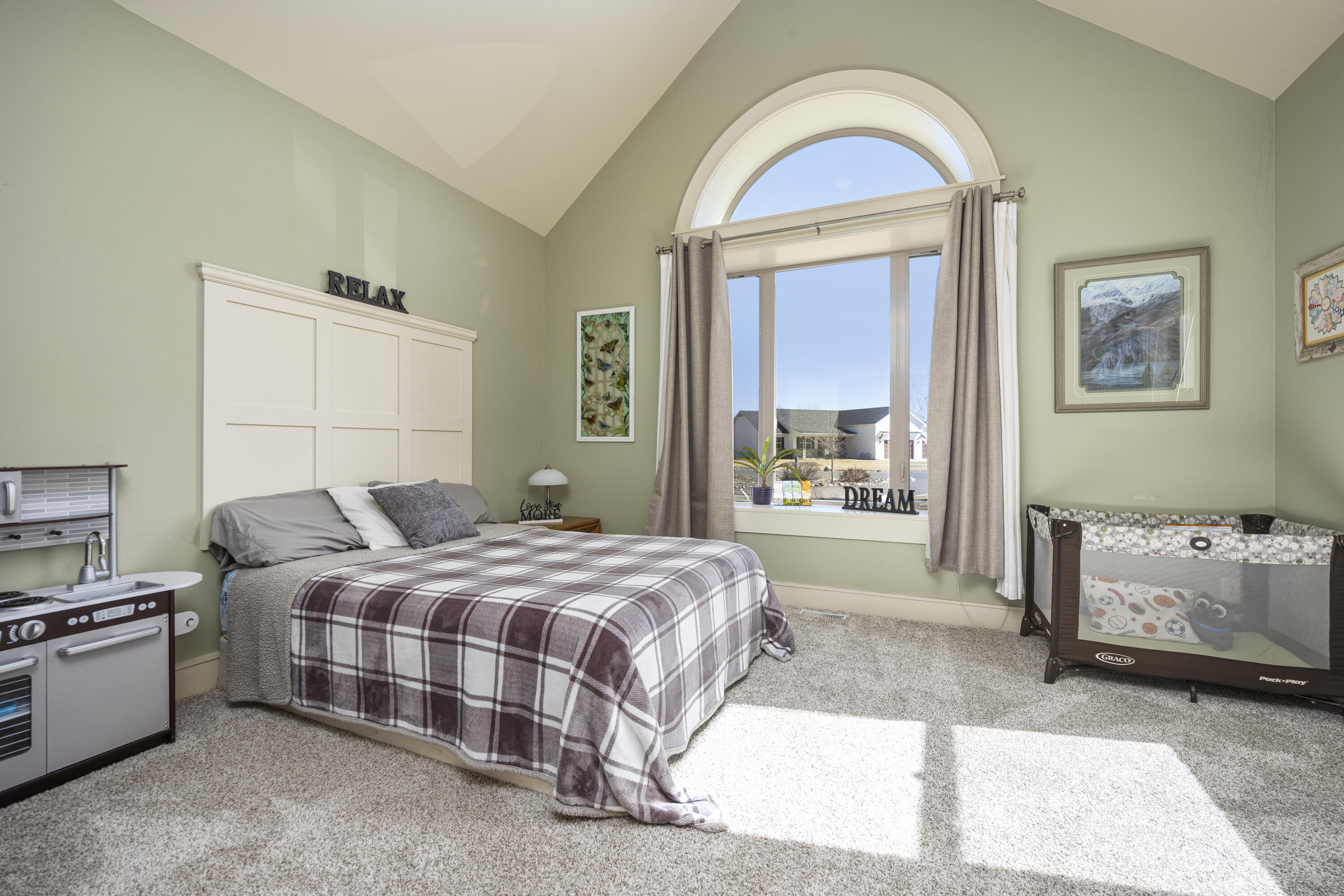 67841 Tumbleweed Road Montrose, CO 81403 - Photo 15 of 21 a bedroom with a bed and a window