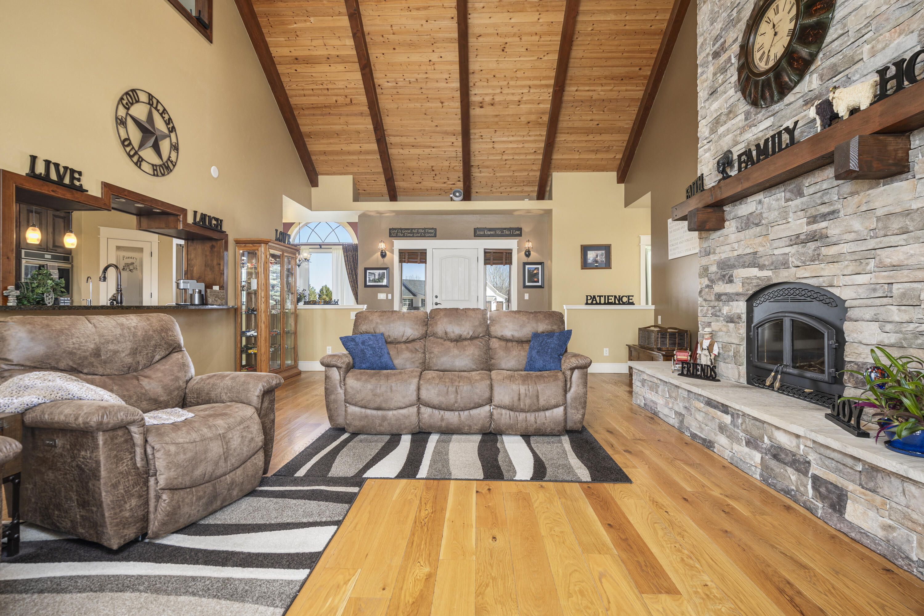 67841 Tumbleweed Road Montrose, CO 81403 - Photo 2 of 21 a living room with furniture and a fireplace