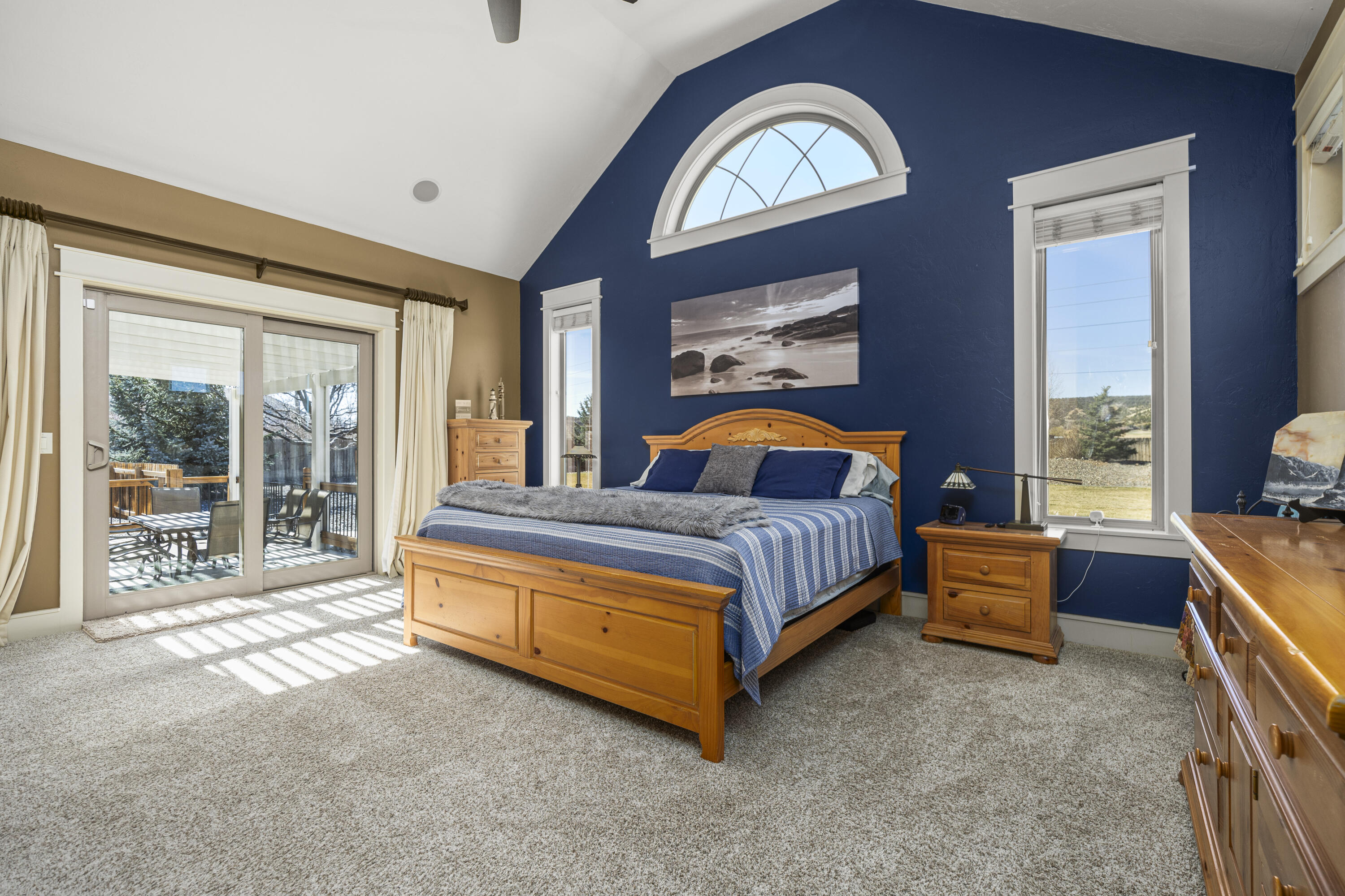 67841 Tumbleweed Road Montrose, CO 81403 - Photo 9 of 21 a bedroom with a bed and a large window