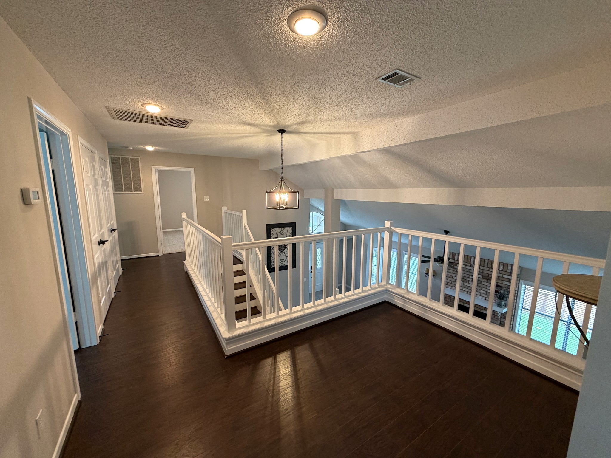 2326 Streamcrest Lane Sugar Land, TX 77479 - Photo 23 of 42 Loft area overlooking formal living and entry area.