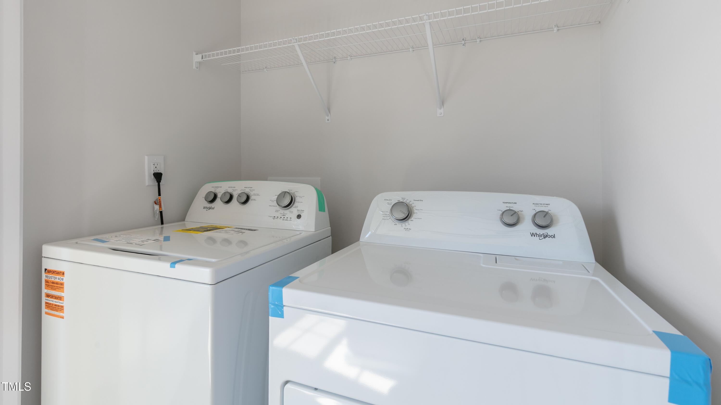 59 Virgo Drive Angier, NC 27501 - Photo 27 of 32 a utility room with dryer and washer