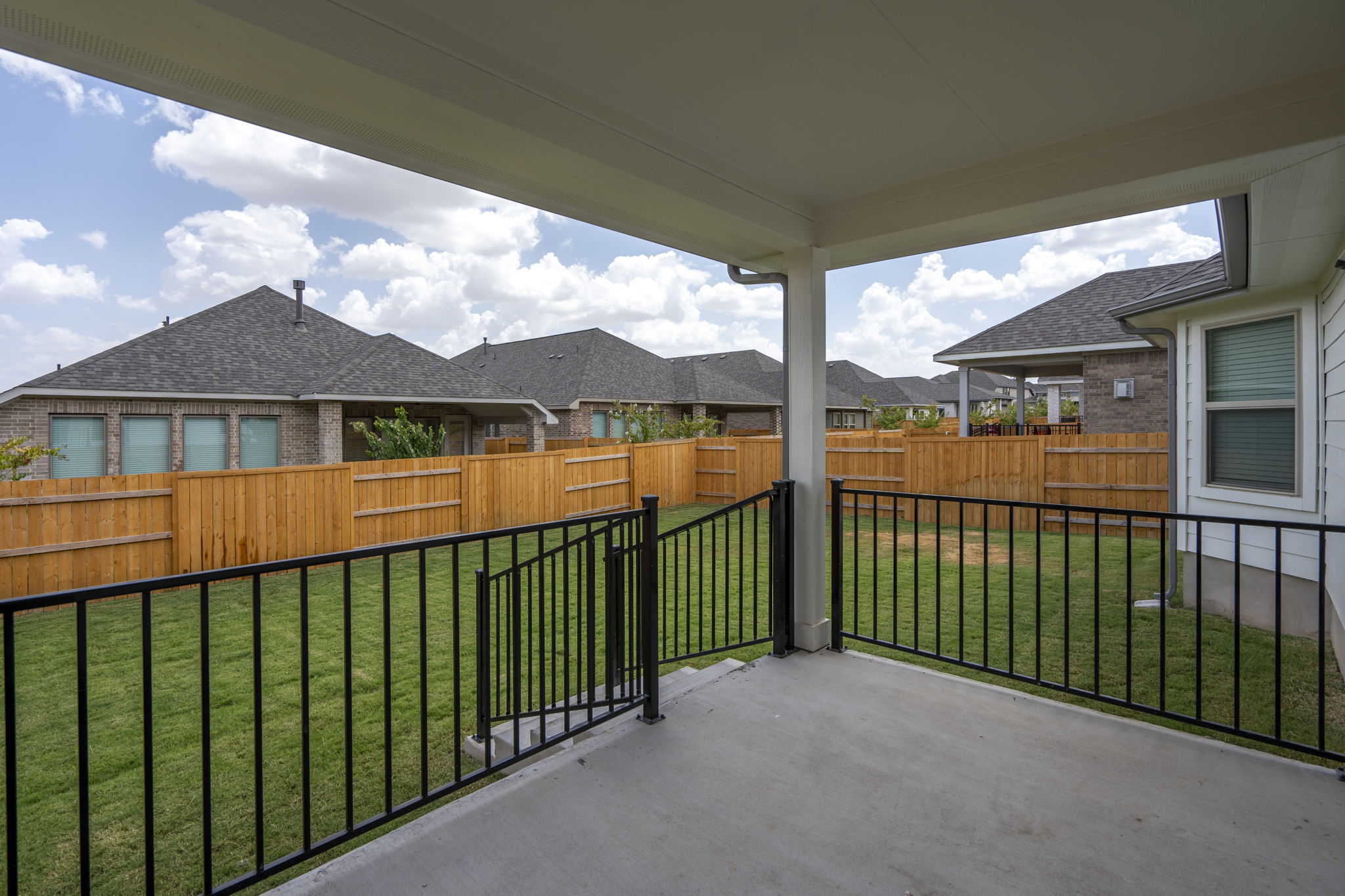 341 Fawn Riv Run Kyle, TX 78640 - Photo 25 of 29 a view of a house with a balcony
