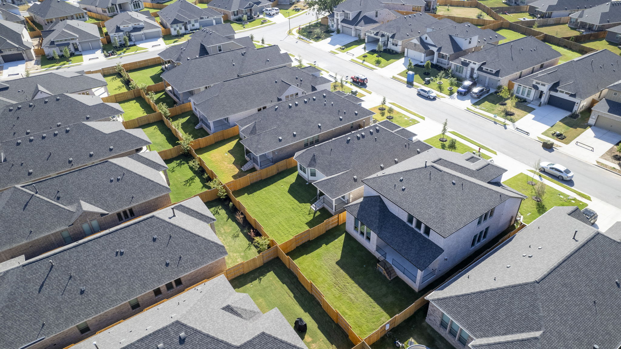 341 Fawn Riv Run Kyle, TX 78640 - Photo 26 of 29 an aerial view of a house with a swimming pool