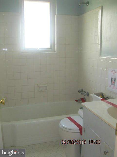 8807 Reading Road Silver Spring, MD 20901 - Photo 13 of 21 a bathroom with a sink and a bathtub