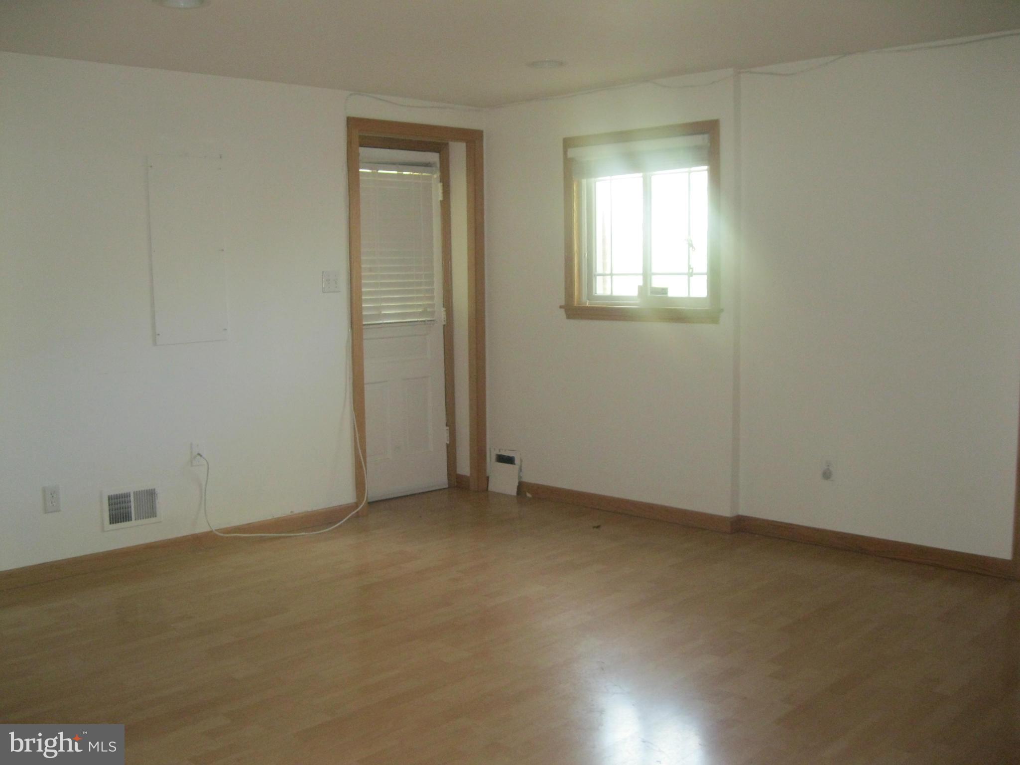 8807 Reading Road Silver Spring, MD 20901 - Photo 14 of 21 an empty room with windows