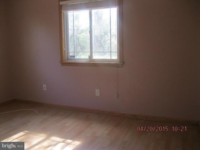 8807 Reading Road Silver Spring, MD 20901 - Photo 17 of 21 an empty room with a window