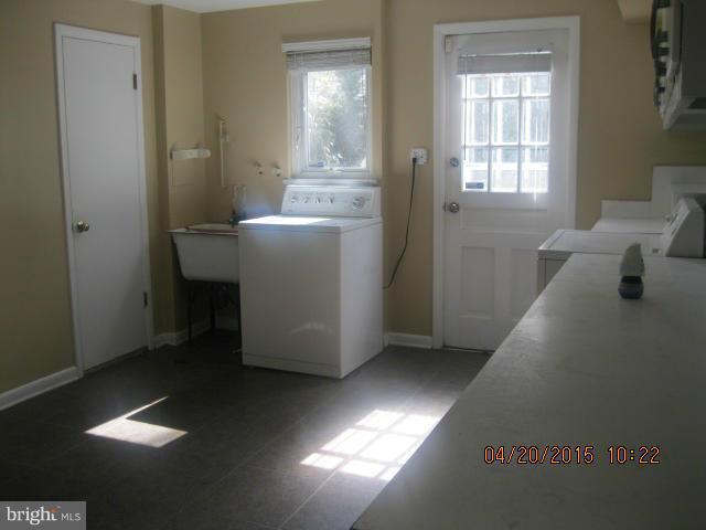 8807 Reading Road Silver Spring, MD 20901 - Photo 20 of 21 a utility room with dryer and washer