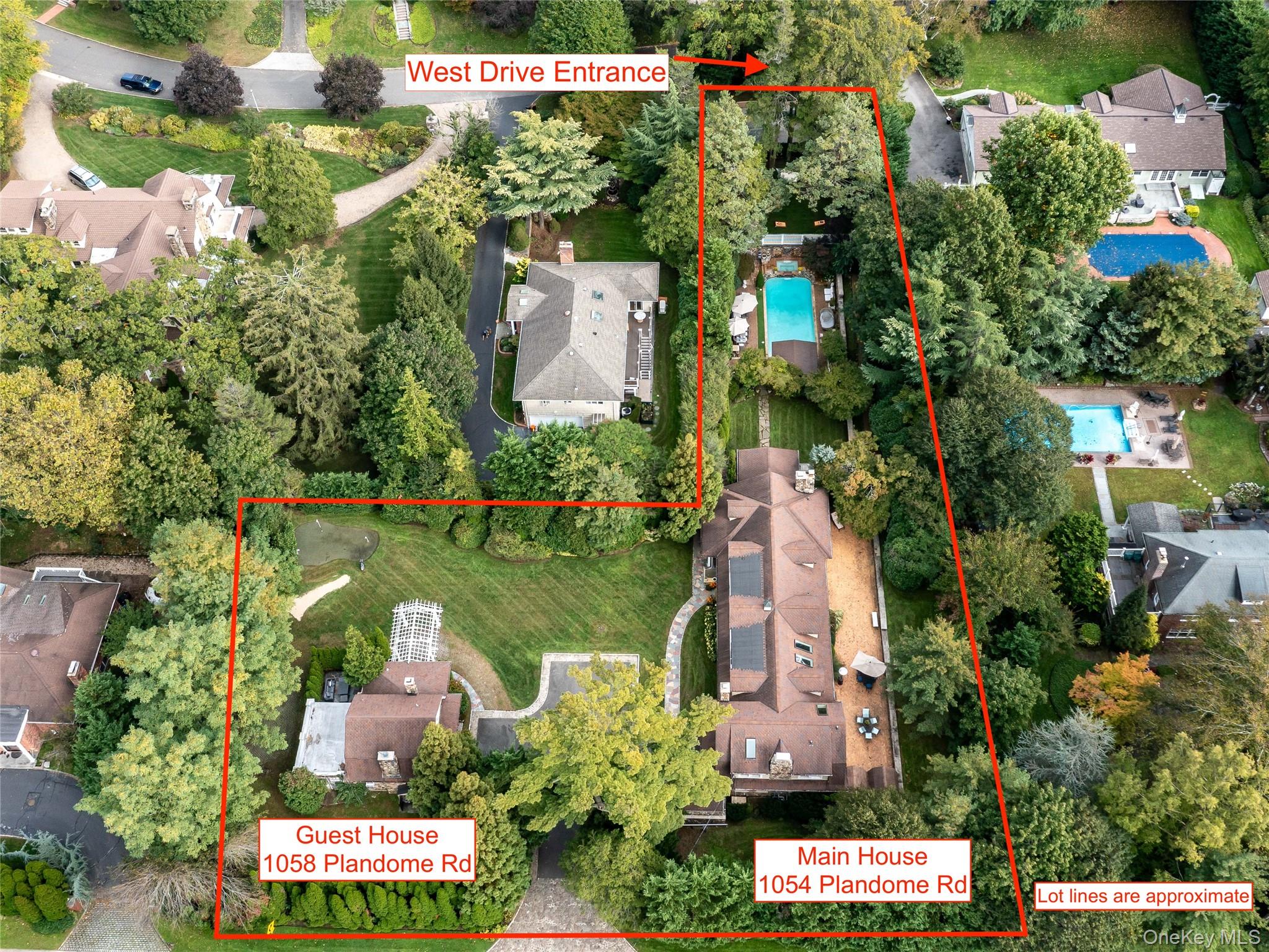 1054 Plandome Road Manhasset, NY 11030 - Photo 42 of 47 an aerial view of house with swimming pool outdoor seating and yard