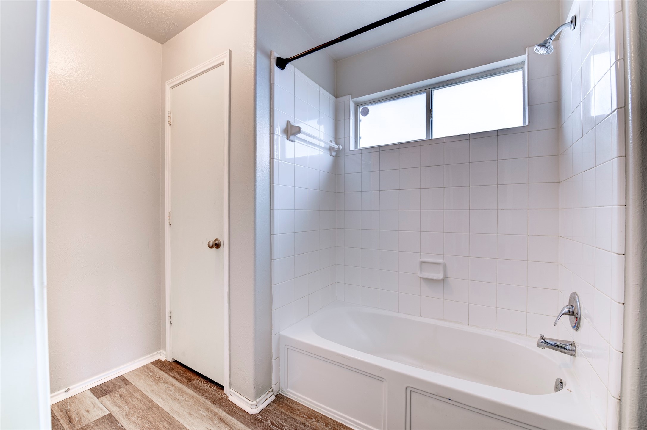 16143 Bantam Ridge Court Houston, TX 77053 - Photo 15 of 18 a bathroom with a bathtub and a shower