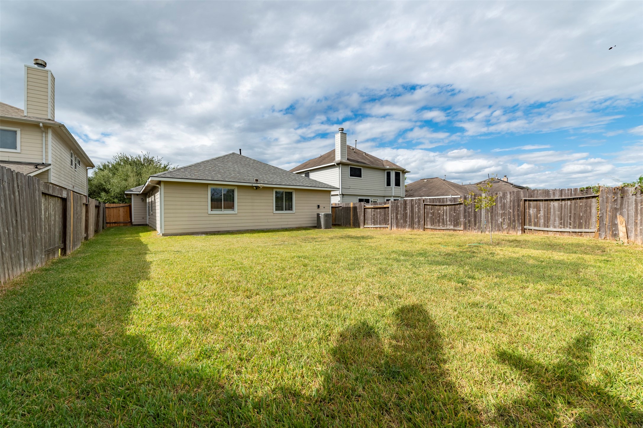 16143 Bantam Ridge Court Houston, TX 77053 - Photo 18 of 18 a front view of a house with a garden