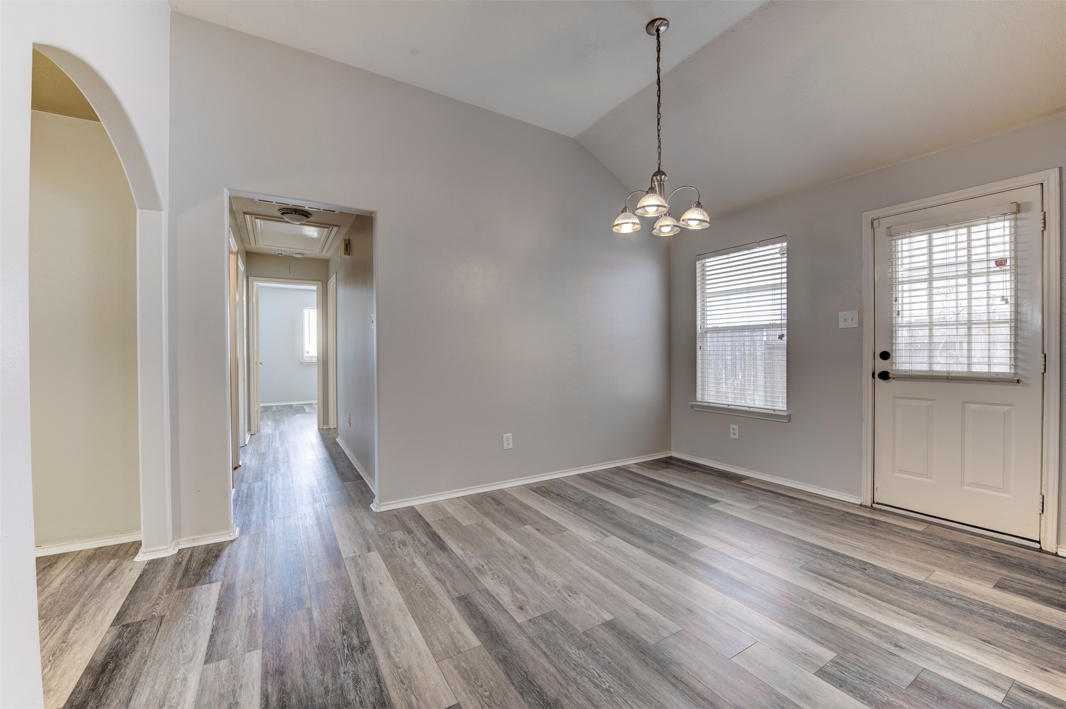 16143 Bantam Ridge Court Houston, TX 77053 - Photo 6 of 18 a view of a room with window and wooden floor