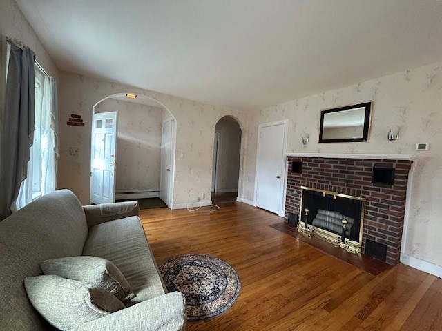 73 Sand Street Gardner, MA 01440 - Photo 13 of 23 a living room with furniture and a fireplace
