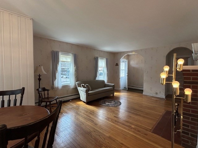 73 Sand Street Gardner, MA 01440 - Photo 14 of 23 a living room with furniture and a wooden floor