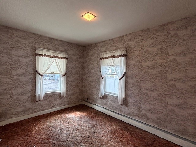 73 Sand Street Gardner, MA 01440 - Photo 16 of 23 an empty room with windows